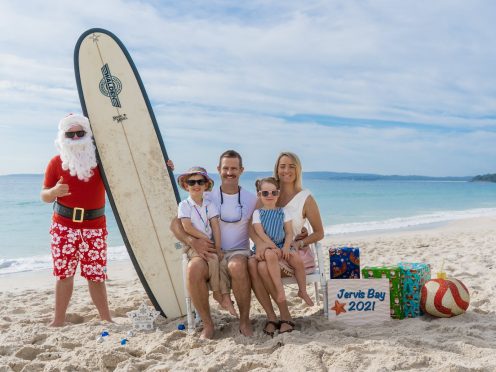 Family photo shoots with Santa on the beach in Jervis Bay