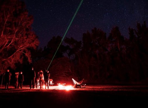 Red lights and laser pointers help stargazers to orientate themselves around the night skies