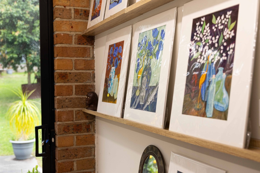 Paintings line the shelves of Victoria's studio, on the Jervis Bay Arts Trail. Photo Tania Genoves