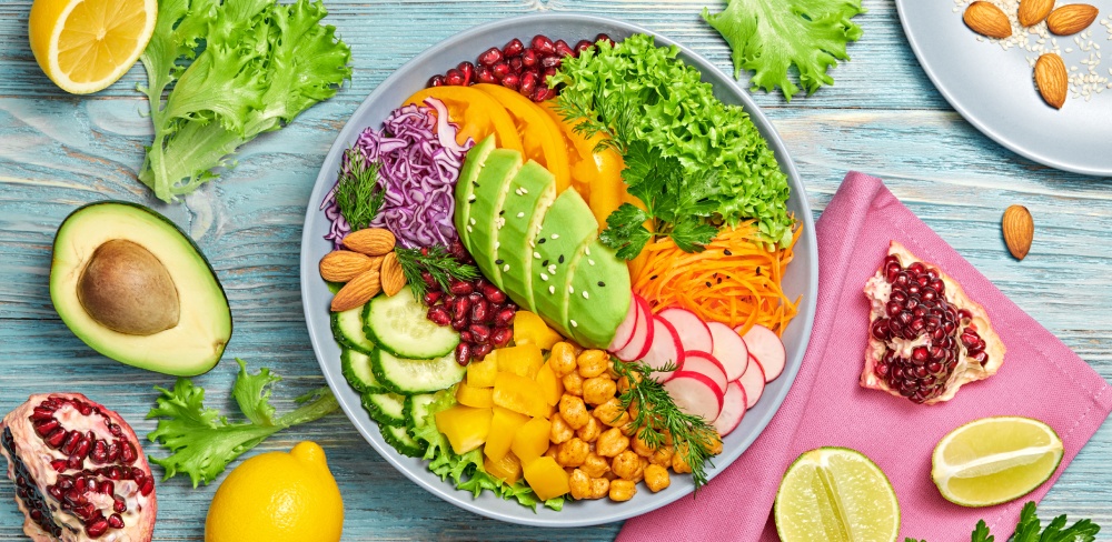 Adding colour and variety in vegetables, legumes, seeds and grains will aid a reset of our gut health. Image Adobe Stock