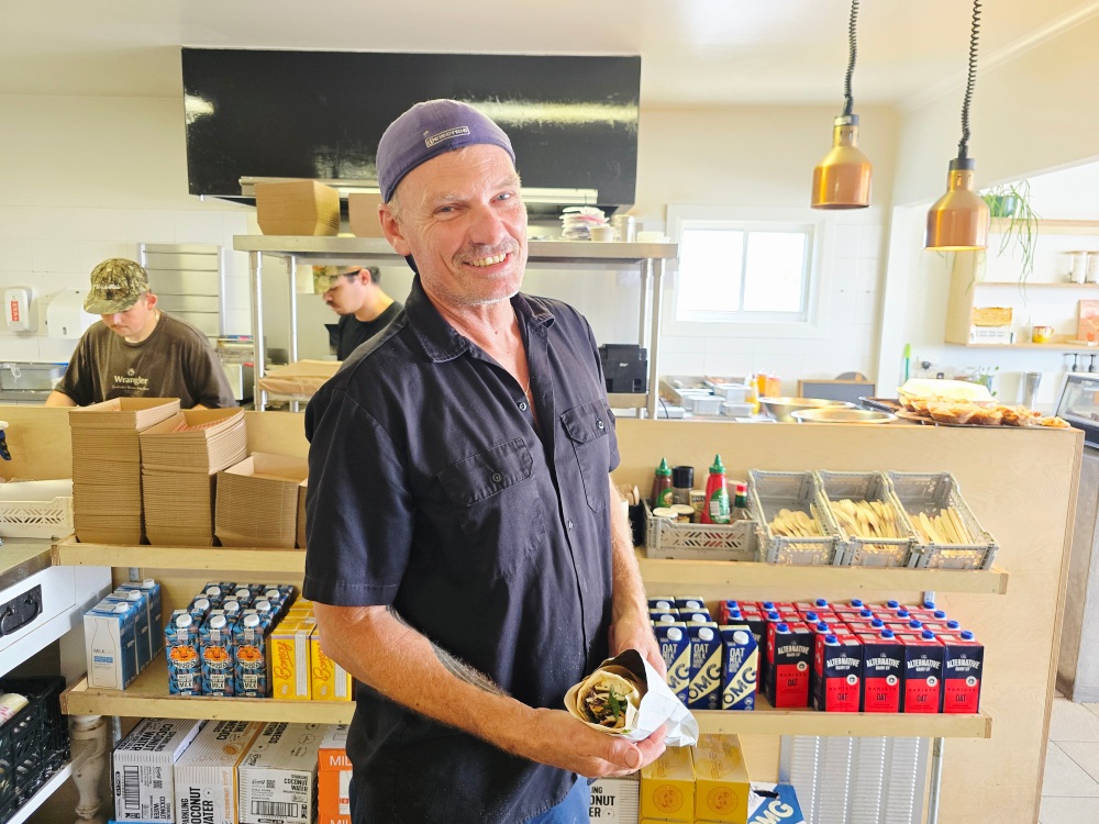 Chef Gaz Fishwick with his Baja fish burrito, in Culburra. Photo: Narrell Tabone