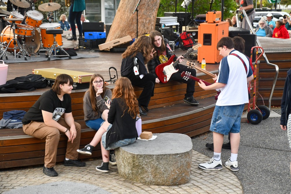 Young musicians performing at the Burton Street shopping village in Vincentia. Photo Leanne Windsor